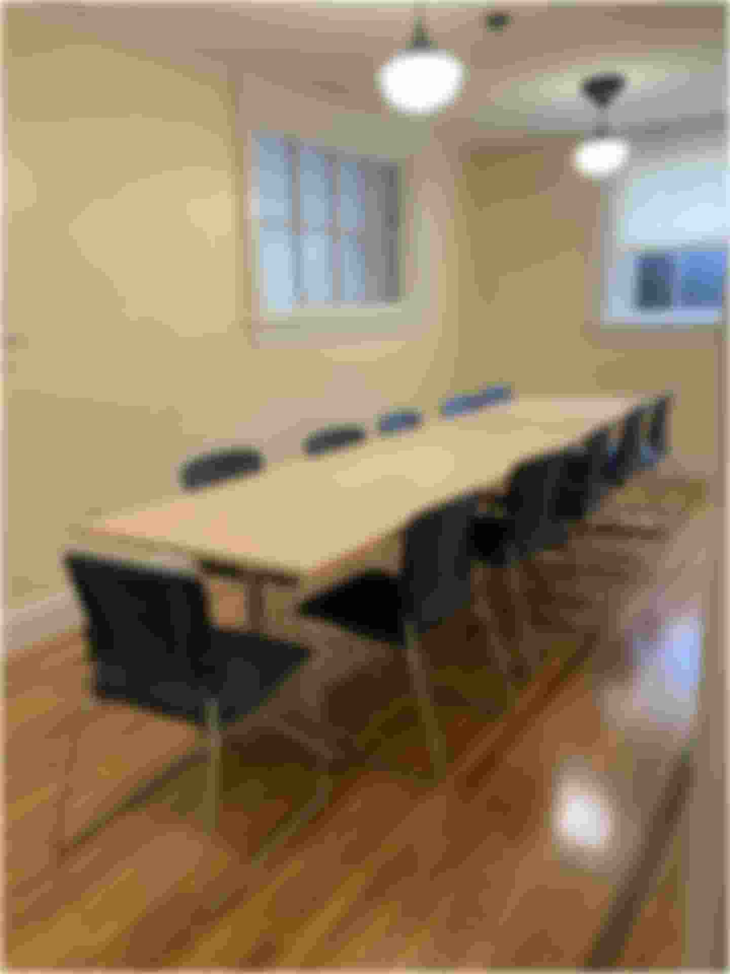 Image of the William Hall Library Small Meeting Room with tables and chairs set up